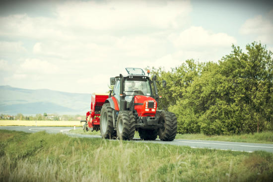 tractor driving on the road