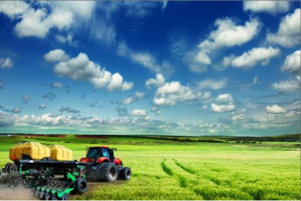 tractor plowing a field