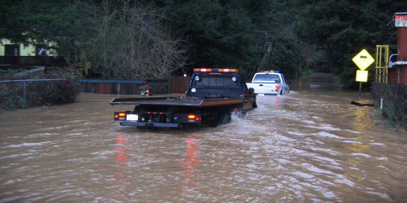 car on flooded street